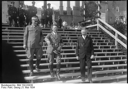 Adolf Hitler with his adjutant Wilhelm Brückner Reichsbank President Hjalmar Schacht